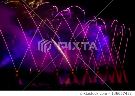 The colorful light of fireworks at Munich Olympiapark, Germany 136657432