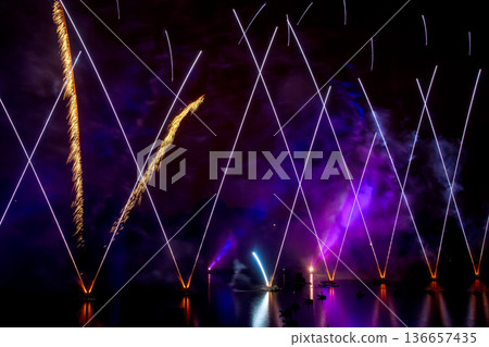 The colorful light of fireworks at Munich Olympiapark, Germany 136657435