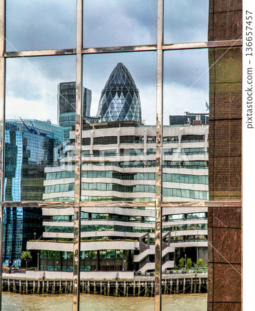 30 St Mary Axe previously known as the Swiss Re Building and informally known as the Gherkin in London, England, United Kingdom 30 St Mary Axe previously known as the Swiss Re Building and informally known as the Gherkin in London, England, United Kingdom 136657457