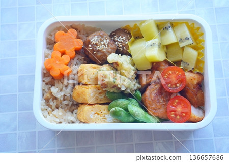 A healthy lunch of colorful homemade bento and brown rice 136657686