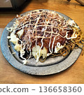 Okonomiyaki served on a plate 136658360