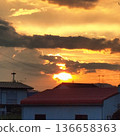 Sunset seen from a residential area 136658363