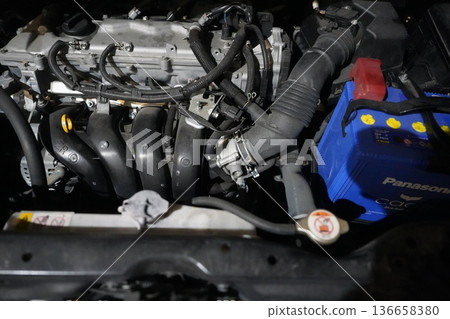 Battery with car engine Battery with car engine 136658380