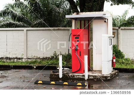 Electric car charging station in the suburbs of Thailand. High quality photo Electric car charging station in the suburbs of Thailand. High quality photo 136658936