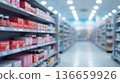 People browse a pharmacy aisle filled with various health products and medications while shopping during the day 136659926