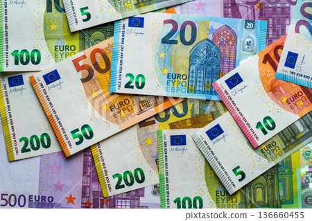 Colorful euro banknotes background showing European currency cash and financial concept theme Colorful euro banknotes background showing European currency cash and financial concept theme 136660455