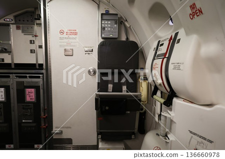 the galley at the rear of the plane the galley at the rear of the plane 136660978
