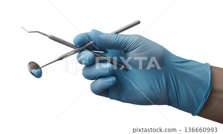 Dentist's gloved hand in blue latex holding various stainless steel dental instruments, isolated for medical education and dental clinic themes 136660993