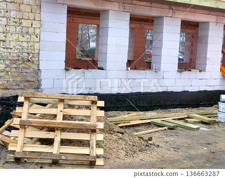 Wooden industrial pallets for transporting and storing building materials 136663287