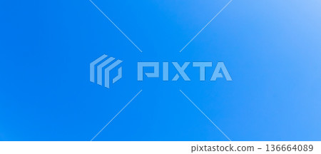 A landscape with a blue sky as the background 136664089