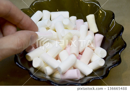 multi-colored marshmallow dessert bars in a glass bowl, close-up multi-colored marshmallow dessert bars in a glass bowl, close-up 136665488