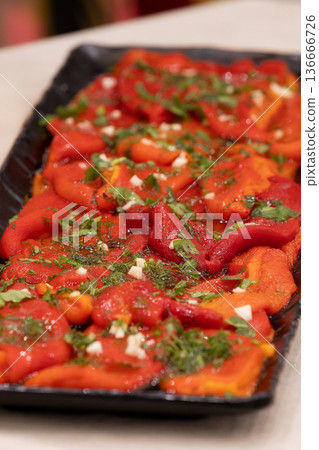 Traditional Bulgarian roasted baked peppers Traditional Bulgarian roasted baked peppers 136666726
