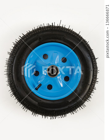 Wheel is pneumatic on a white background. Black rubber, blue disc. 136666871