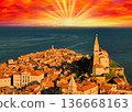 St. George's Church and evening view of Piran 136668163