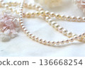 Pearl necklace and dried flowers 136668254