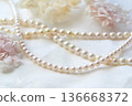 Pearl necklace and dried flowers 136668372