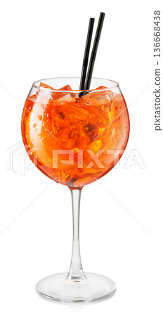 Cold aperol spritz cocktail in glass with straw isolated on white background 136668438