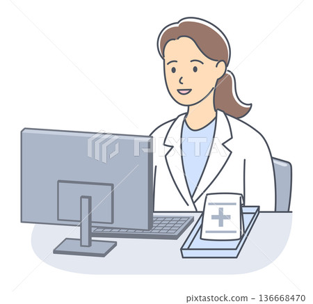 A female pharmacist sitting in front of a computer 136668470