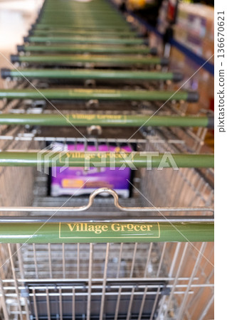 Grocery shopping carts lined up at Village Grocer in Penang's market area Grocery shopping carts lined up at Village Grocer in Penang's market area 136670621