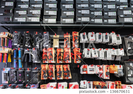 Store display featuring various bike accessories and parts available for purchase 136670631