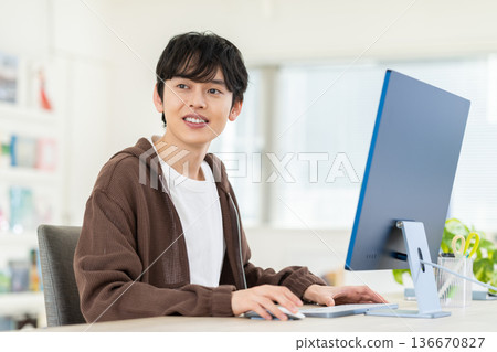 Young engineer working in the office Young engineer working in the office 136670827