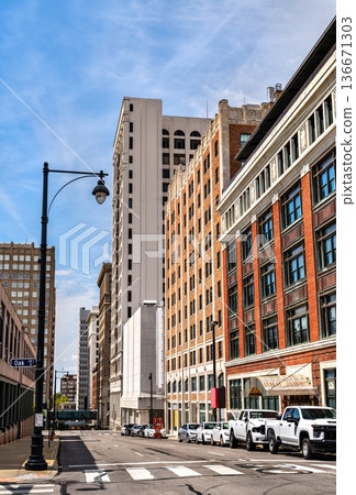Historic Pickwick Plaza building in downtown Kansas City, Missouri. Early 20th century architecture features a brick and stone facade at 10th and Oak Street under a blue sky Historic Pickwick Plaza building in downtown Kansas City, Missouri. Early 20th century architecture features a brick and stone facade at 10th and Oak Street under a blue sky 136671303