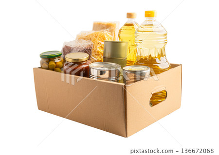 Foodstuffs in donation box isolated on white background with clipping path. 136672068