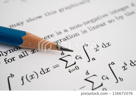 Pencil on mathematic formula exercise test paper in education school. Pencil on mathematic formula exercise test paper in education school. 136672076