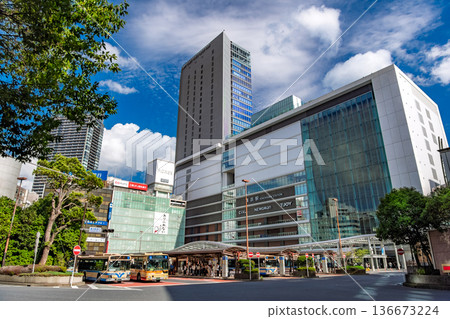 Yokohama City, Kanagawa Prefecture JR Yokohama Tower towering against the blue sky and the station front at the west exit of Yokohama Station 136673224