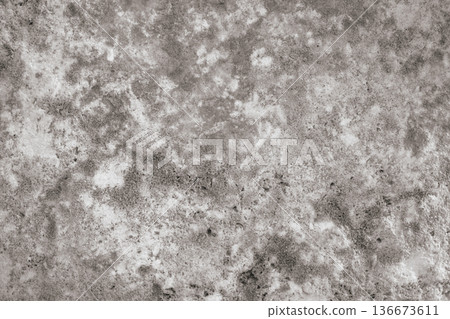 Grey natural stone texture close-up. Raw concrete or dark granite surface with rough mineral pattern Grey natural stone texture close-up. Raw concrete or dark granite surface with rough mineral pattern 136673611