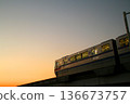 Osaka monorail running in the sunset 136673757