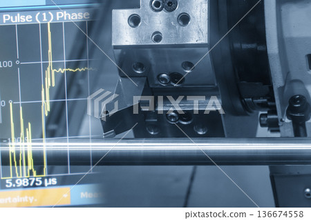 Abstract CNC Lathe Turning of Metal Shaft with Graph Background 136674558