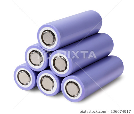 Pile of lithium batteries close-up on a white background. Isolated Pile of lithium batteries close-up on a white background. Isolated 136674917