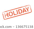Vibrant orange HOLIDAY word rubber stamp for festive celebrations and seasonal travel promotions 136675138