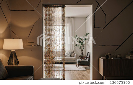 Beaded curtain doorway golden wood beads hang in an entrance leading to a retro mid century modern living room interior 136675500