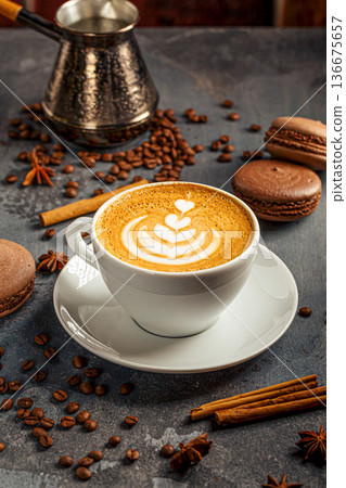 Latte with heart art and coffee beans Latte with heart art and coffee beans 136675657