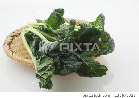 Bamboo basket and tatsoi Bamboo basket and tatsoi 136676325
