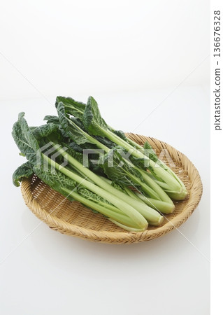 Bamboo basket and tatsoi Bamboo basket and tatsoi 136676328