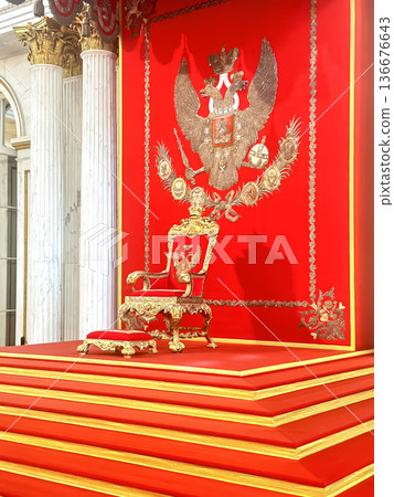 The luxurious interiors of the Peter the Great Hall (Small Throne Room) in the Hermitage Museum in St. Petersburg, Russia. The luxurious interiors of the Peter the Great Hall (Small Throne Room) in the Hermitage Museum in St. Petersburg, Russia. 136676643
