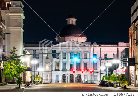 Old Mississippi State Capitol Museum in Jackson. Historic Greek Revival architecture features a dome and columned portico viewed from East Capitol Street at night Old Mississippi State Capitol Museum in Jackson. Historic Greek Revival architecture features a dome and columned portico viewed from East Capitol Street at night 136677135
