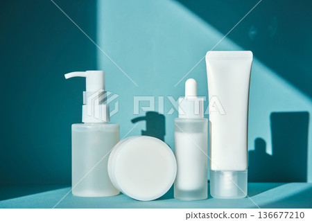 Beauty product bottles with natural light and shadow 136677210