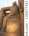 Colossal seated statue of Ramses II in the Luxor Temple 136677481