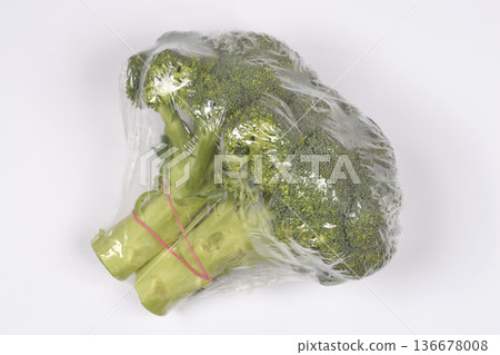 Broccoli Head in Plastic Packaging 136678008