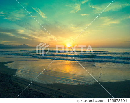 Seascape in the early morning. Sunrise over the sea Seascape in the early morning. Sunrise over the sea 136678704