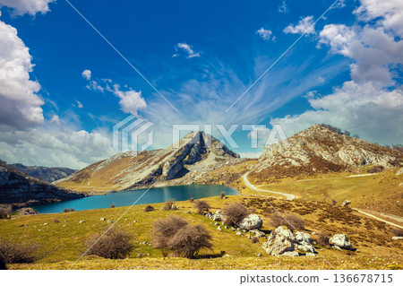 Beautiful mountain landscape. Peaks of Europe (Picos de Europa) National Park. A glacial Lake Enol. Asturias, Spain, Europe Beautiful mountain landscape. Peaks of Europe (Picos de Europa) National Park. A glacial Lake Enol. Asturias, Spain, Europe 136678715