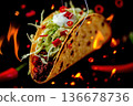 Hot taco captured mid-air with dynamic energy. 136678736
