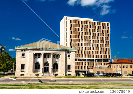 Historic Kansas Masonic Grand Lodge stands in front of the Dwight D. Eisenhower State Office Building in Topeka, Kansas. The Neoclassical structure features a limestone facade with columns Historic Kansas Masonic Grand Lodge stands in front of the Dwight D. Eisenhower State Office Building in Topeka, Kansas. The Neoclassical structure features a limestone facade with columns 136678949