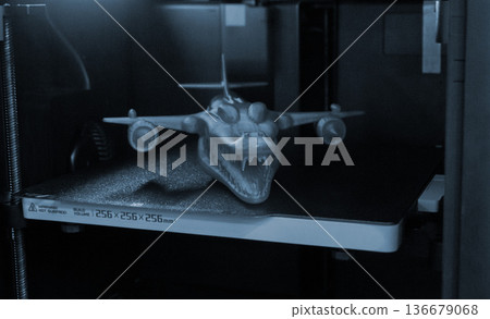 Form printed on 3D printer from plastic. Art shape made using 3D printing from filament inside 3D printer. Additive manufacturing. Layer-by-layer application of material. 3D printing technologies. FDM Form printed on 3D printer from plastic. Art shape made using 3D printing from filament inside 3D printer. Additive manufacturing. Layer-by-layer application of material. 3D printing technologies. FDM 136679068