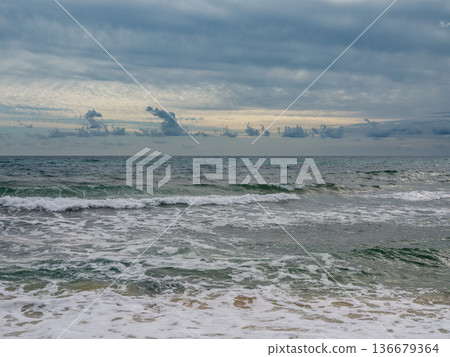 Serene Solitude: Dramatic Skies over Empty Tunisian Shores Serene Solitude: Dramatic Skies over Empty Tunisian Shores 136679364