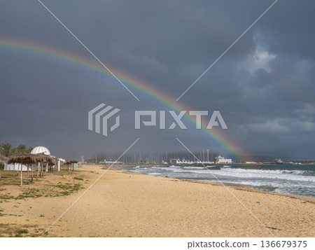Coastal Colors: A Rainbow Over the Deserted Mediterranean Coastal Colors: A Rainbow Over the Deserted Mediterranean 136679375
